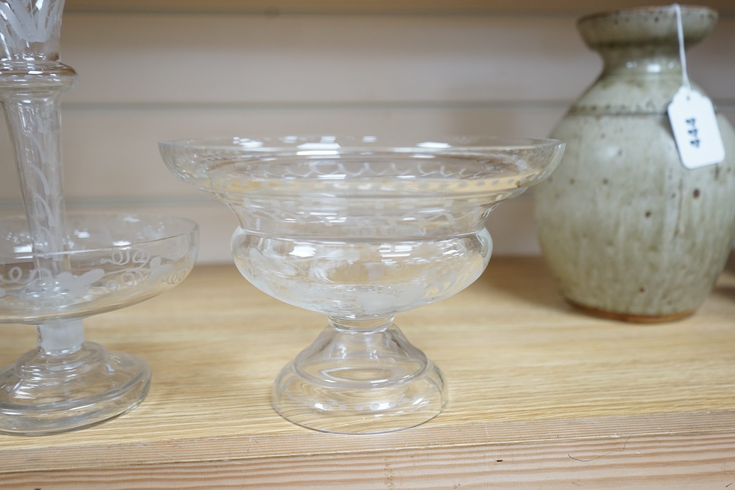 Victorian and later glassware comprising a pair of glass obelisks, an epergne and a similar glass pedestal dish, epergne 24cm high. Condition - obelisk painting worn, all good condition